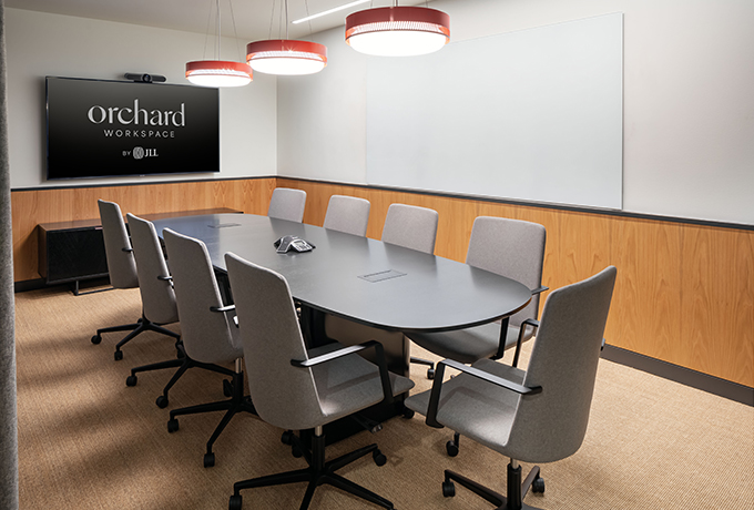 Meeting room with whiteboard and TV